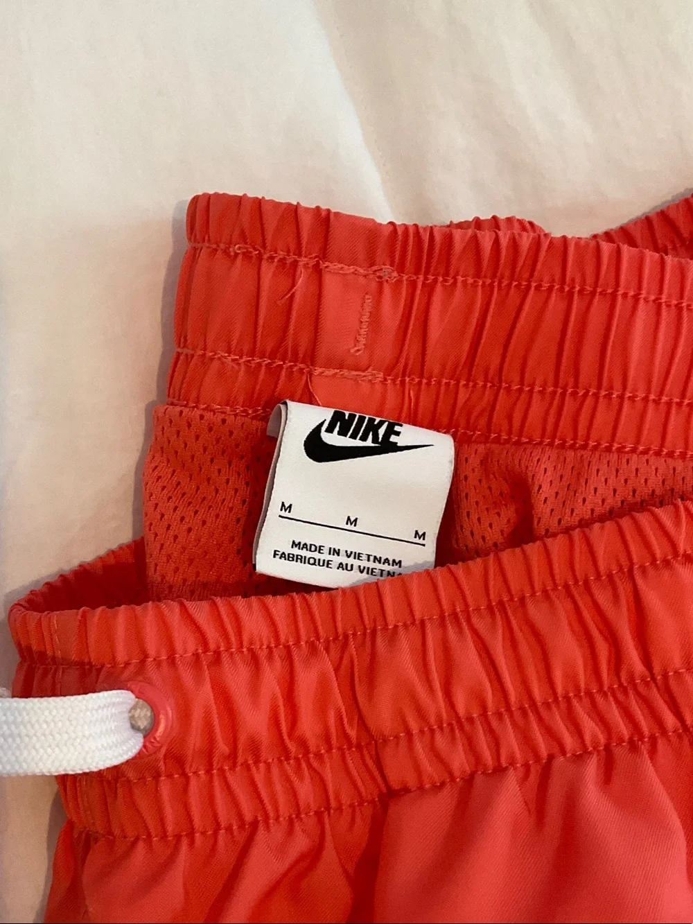 Nike men Coral-orange Athletic Shorts/ trunks lined
